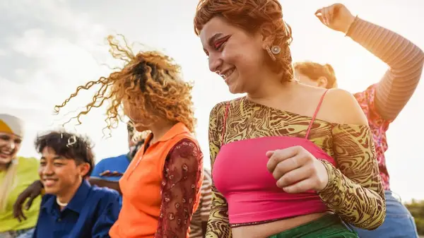 Group of different people dancing