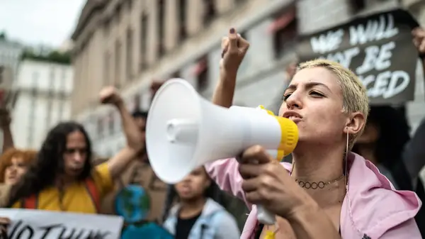 woman leading demonstration