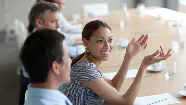 Woman engaging at work meeting