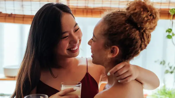 A couple smiling at each other