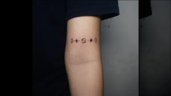 Cancer symbols tattoo