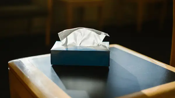 Tissue box on wooden table