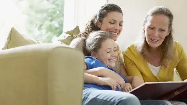 Woman looking at a photo album