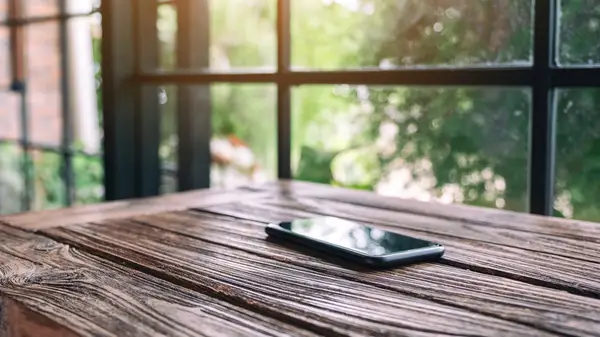 Cell phone alone on table