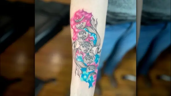 Double fish and moon tattoo