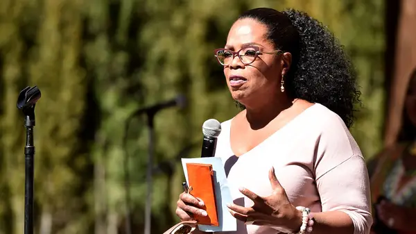 Oprah Winfrey speaking at a book launch