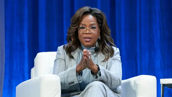 Oprah Winfrey presenting a panel