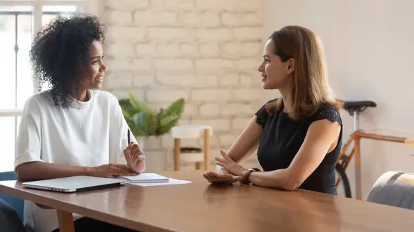 Two women in an interview 