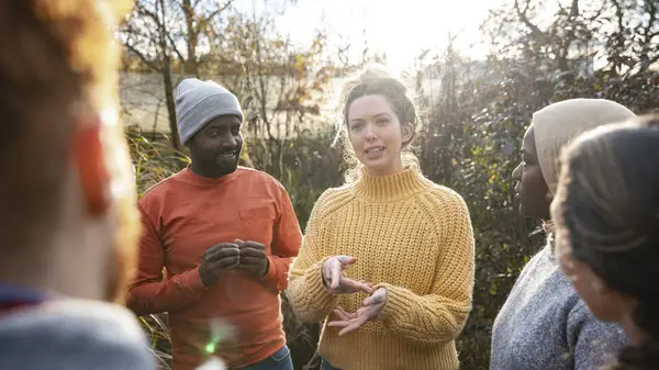 Multiple people engaged in discussion