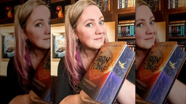 Rebecca Yarros with her book