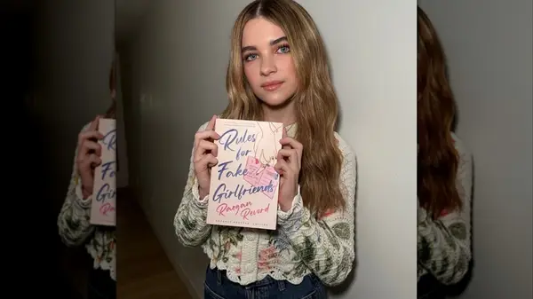 Raegan Revord with their book Rule for Fake Girlfriends