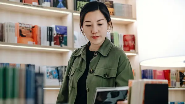 Woman looking at a book