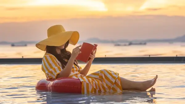 Woman reading in the summer
