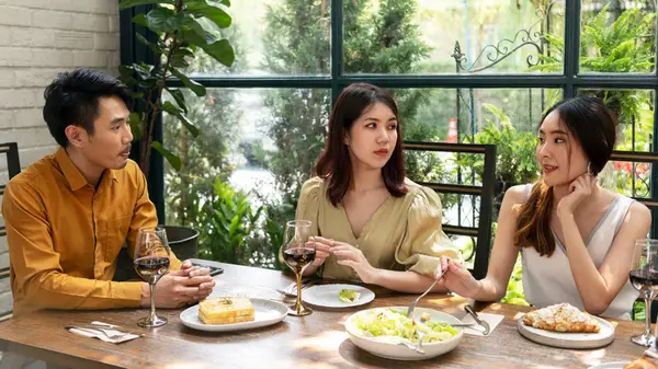 Three people having lunch