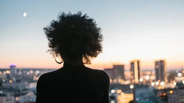 Woman looking at moon