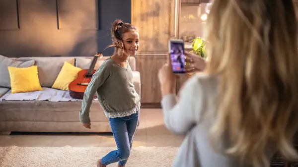 mom recording daughter