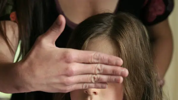 mom blinding daughter