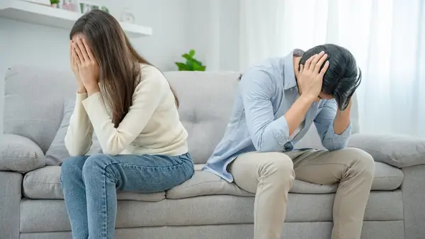 upset couple facing away from each other