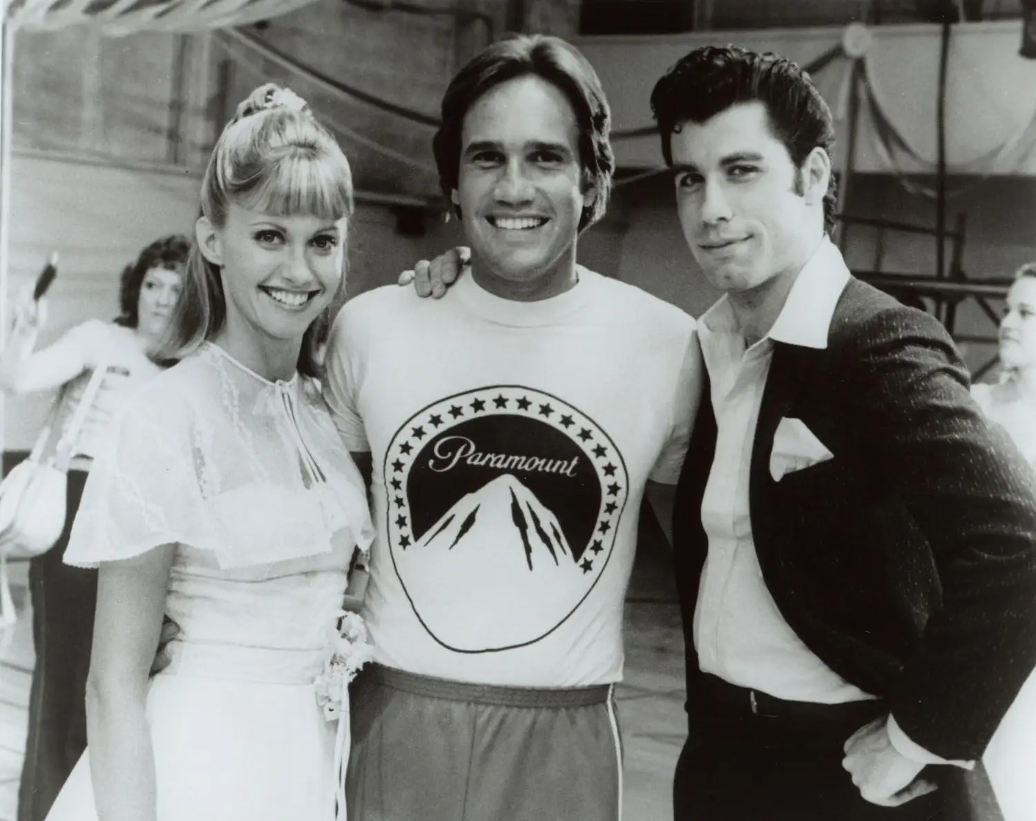 ředitel mastnota travolta, newton-john