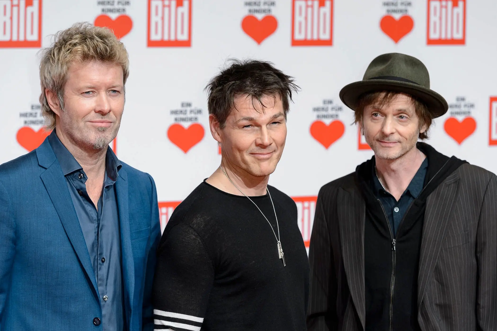 Magne Furuholmen, Morten Harket e Pal Waaktaar-Savoy do a-ha no A Heart for Children em Berlim