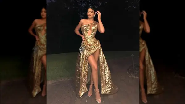 Kylie Jenner wearing a gold ball gown
