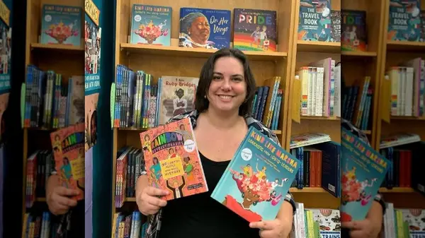 Sarah Prager holding two of her books