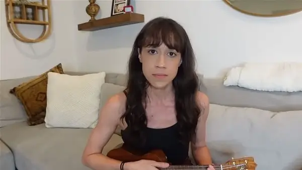 Collen Ballinger holds ukelele