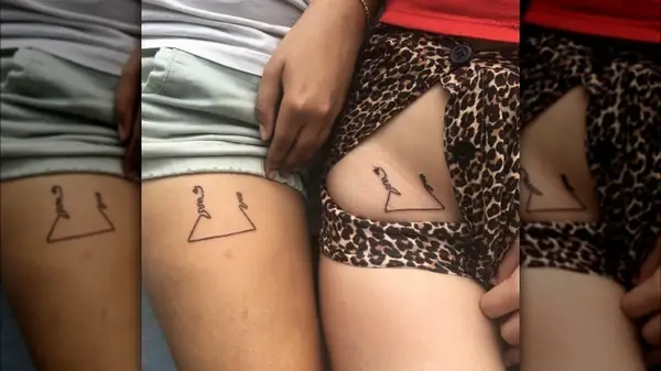 Undone coat hanger tattoos