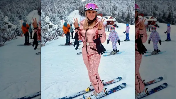 Karoline Leavitt in a metallic snowsuit