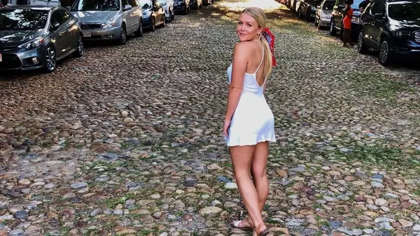 Karoline Leavitt in a white dress