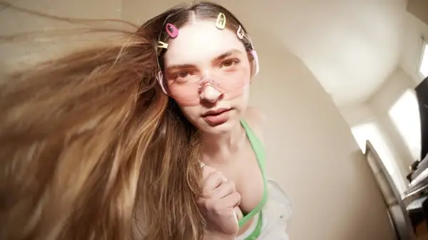 Model posing for TomboyX