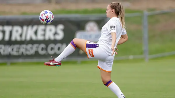 Woman playing soccer 
