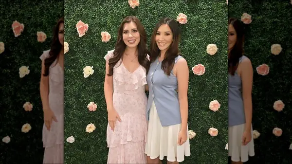 Conservative influencer Lauren Chen poses for a photo with friend a photo at an event