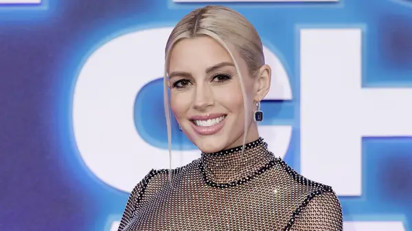 Heather Rae El Moussa posing