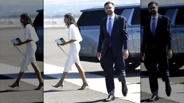 Usha Vance walking away from JD Vance in a white dress