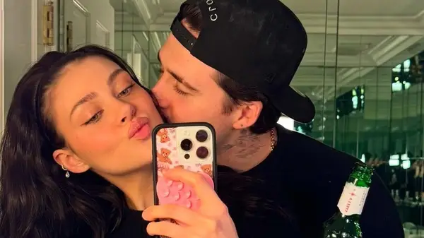 Brooklyn Peltz Beckham kissing Nicola Peltz Beckham in a mirror selfie