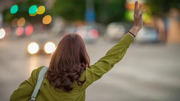 Woman hails cab