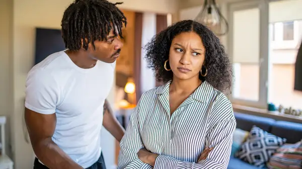 couple arguing in living room
