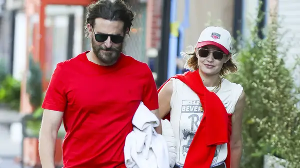 Bradley Cooper and Gigi Hadid walking together on the street