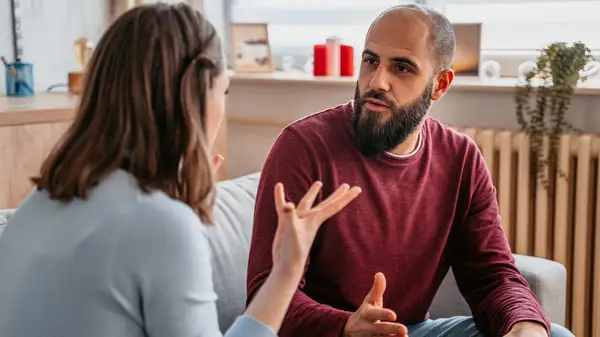 A couple having a conversation 