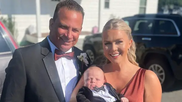 Nicholas Riccio, Karoline Leavitt, and their son