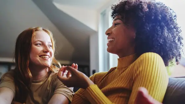 couple talking on couch
