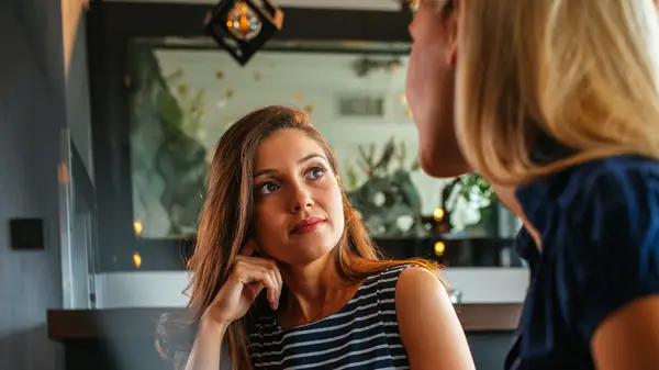 woman listening attentively