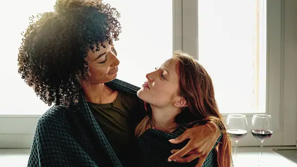 lesbian couple embracing