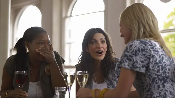 Three friends in a coffee shop 