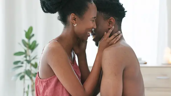Couple kissing and smiling