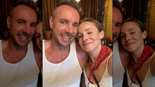 Dax Shepard posing with Kristen Bell