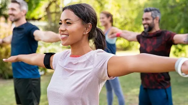 Woman doing outdoor workout class