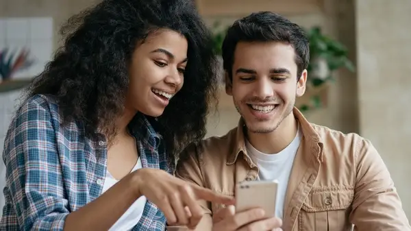 Couple looking at phone