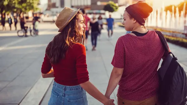 Couple holding hands